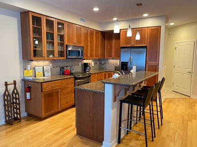 Kitchen with Bar Seating for three.