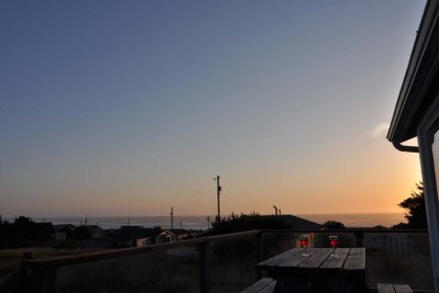 Friends, family, wine, good food and a sunset from The Waves House deck